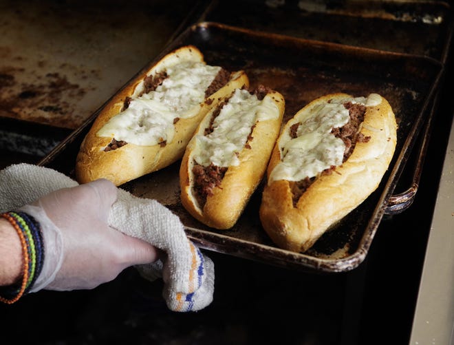 The classic steak & cheese sandwich, fresh out of the oven, for which the Supreme House of Pizza has become known for, cooked to perfection and ready to go for a lucky and hungry customer. Pictured on Tuesday, Nov. 14, 2023.
