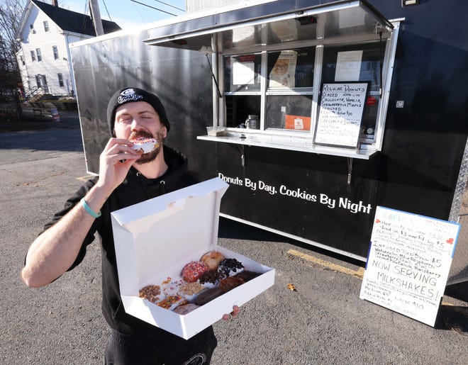 Jason Correia owner of Sweet Kneads Bake Truck sells cookies, doughnuts and more outside the Bridgewater Citizen's Club, 60 Hale Street on Thursday, Dec. 14, 2023.