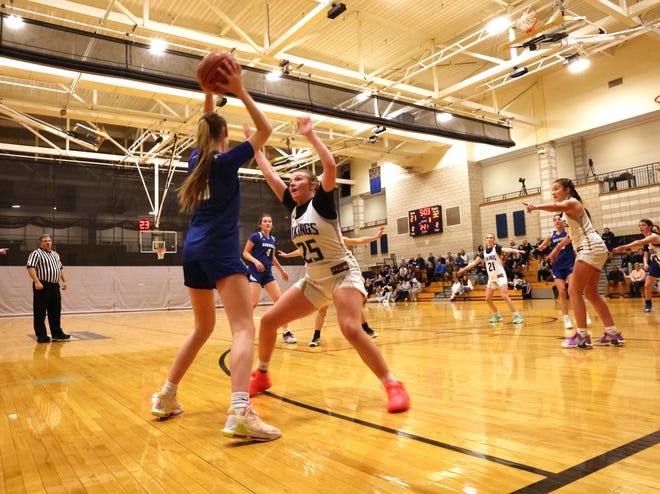 East Bridgewater defender Jessica Long guards Norwell's Paige Maguire during a game on Friday, Jan. 5, 2024.