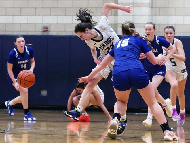 East Bridgewater's Shania Gardner was fouled by Norwell's Reagan Dowd during a game on Friday, Jan. 5, 2024.