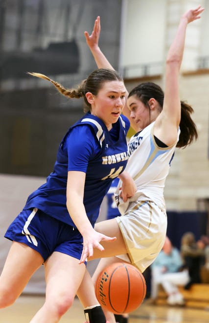 Norwell's Madison Oliver dribbles around East Bridgewater defender Liv McManus during a game on Friday, Jan. 5, 2024.