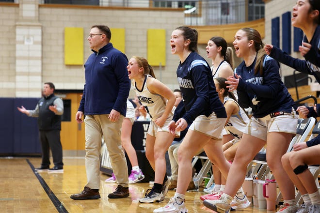 East Bridgewater players cheer on teammates during a game versus Norwell on Friday, Jan. 5, 2024.