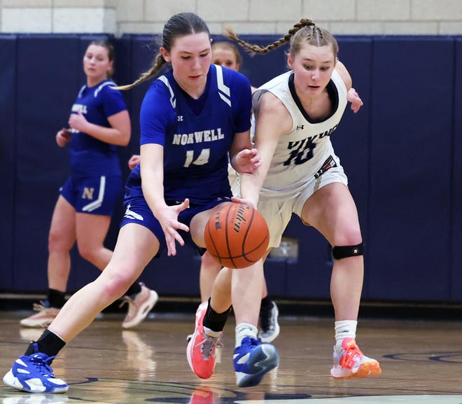 East Bridgewater's Liv Pavidis takes the ball away from Norwell's Madison Oliver during a game on Friday, Jan. 5, 2024.