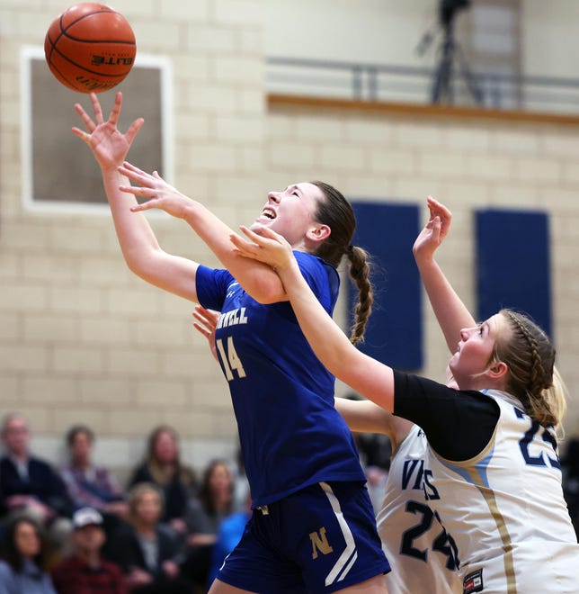 Norwell's Madison Oliver was fouled by East Bridgewater's Jessica Long during a game on Friday, Jan. 5, 2024.