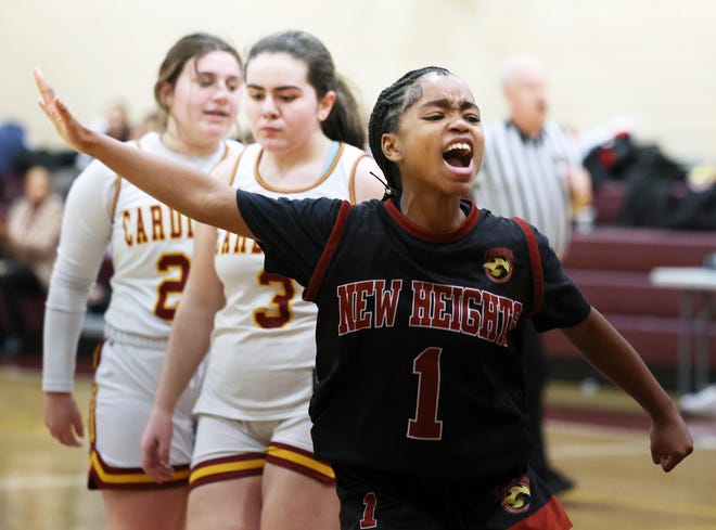 New Heights Rutrice DoQuental celebrates a teammates basket during a game versus Cardinal Spellman on Tuesday, Jan. 9, 2024.