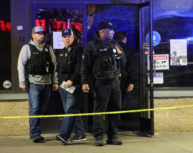 Brockton and State Police investigate at the scene of a fatal shooting inside Hibachi Sushi Supreme Buffet Brockton on Friday, Jan. 12, 2024.